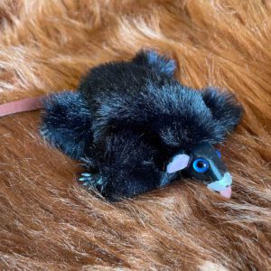 Cute black mouse plushie with tongue