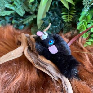 Cute black mouse plushie with tongue